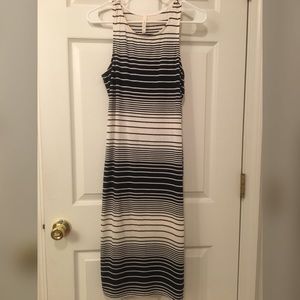 Fitted cream and navy horizontal stripped dress.